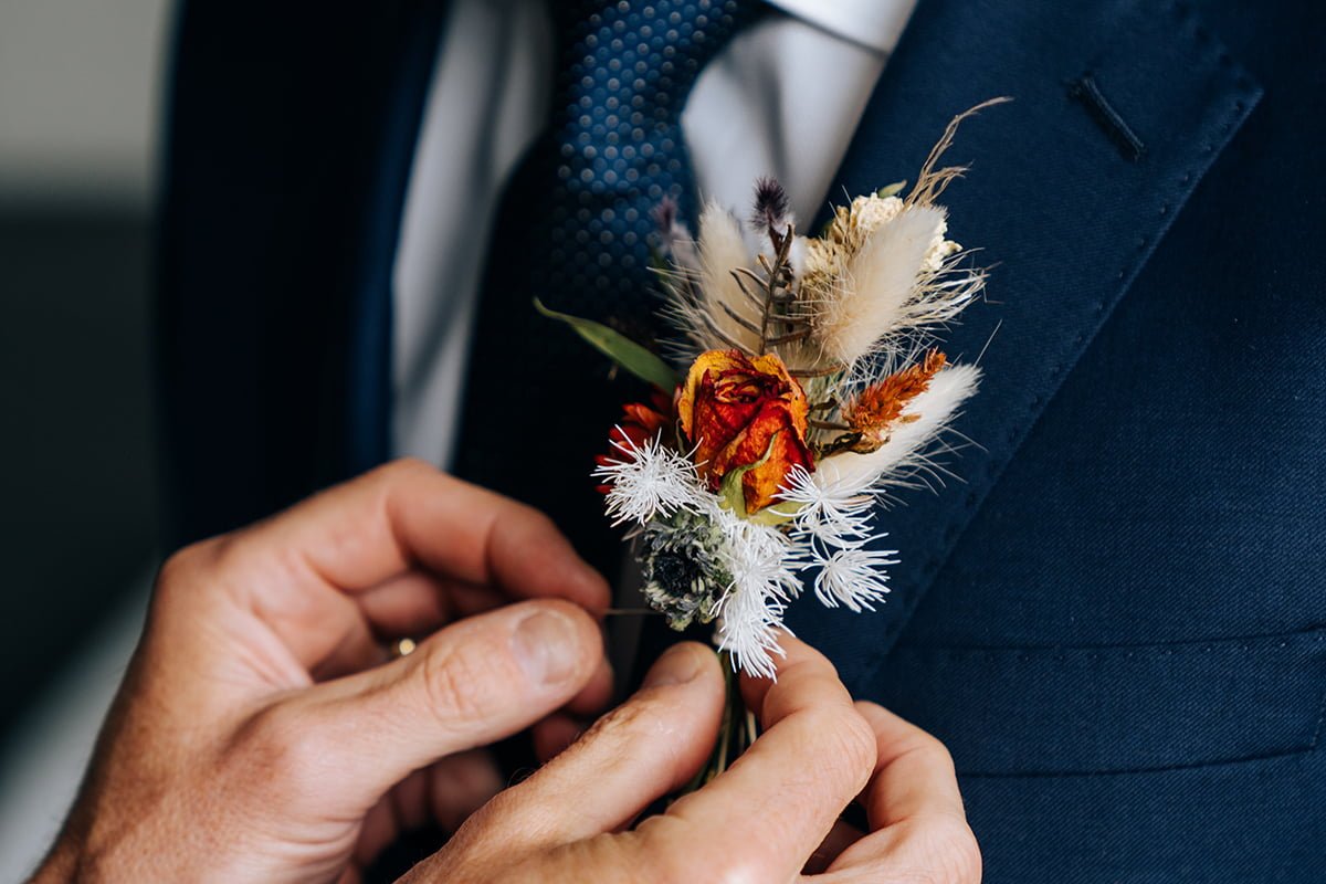 Orange Groomsmen Boutonniere Inspiration