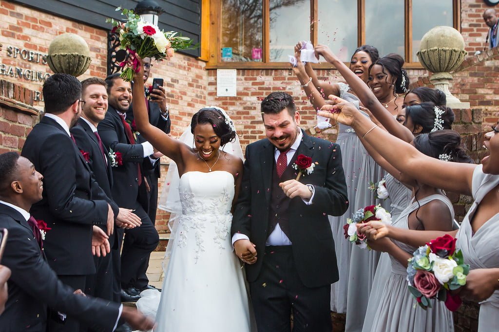 Confetti Over Bride and Groom