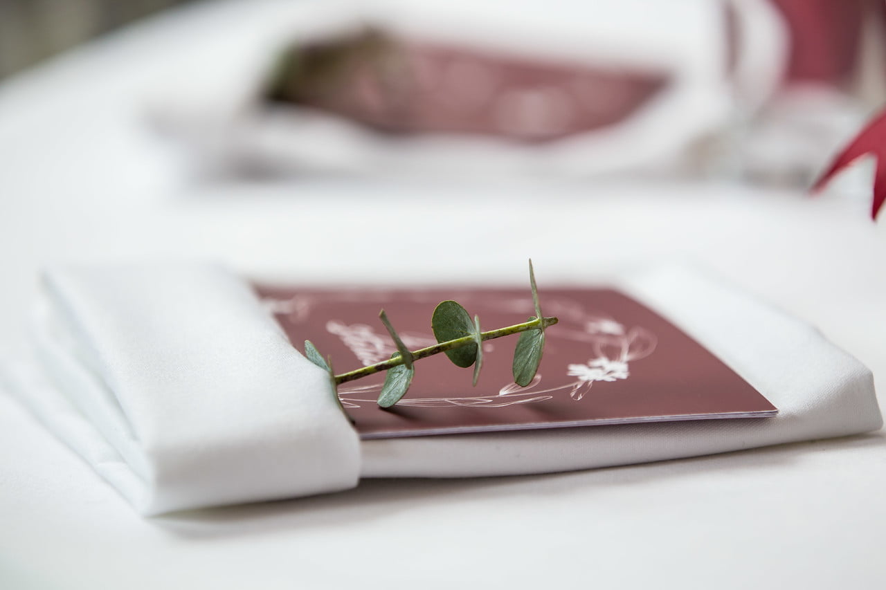 Taxidis Wedding Booklet on Table